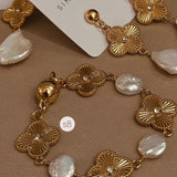 Pulseira Trevo com Ponto de Luz e Pérola Barroca Moeda