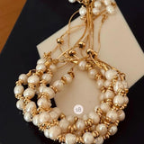 Pulseira Unitária Pérolas Barrocas com Dourado - Ajustável